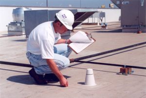 Man Completing a Roof Inspection